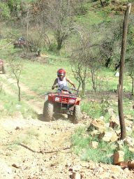 Later that day we met up with some of the guys that rented quads for the day, and tacha decided to to take a pic of one of them climbing a pariclularly steep hill